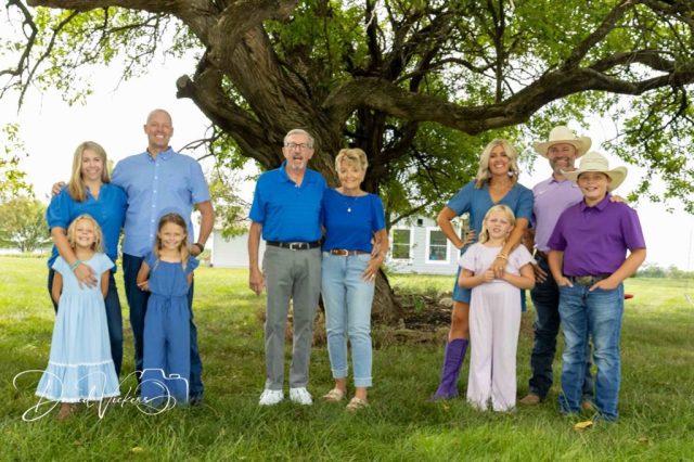 Three generations of the Ferguson family under an old tree Three generations of the Ferguson family under an old tree