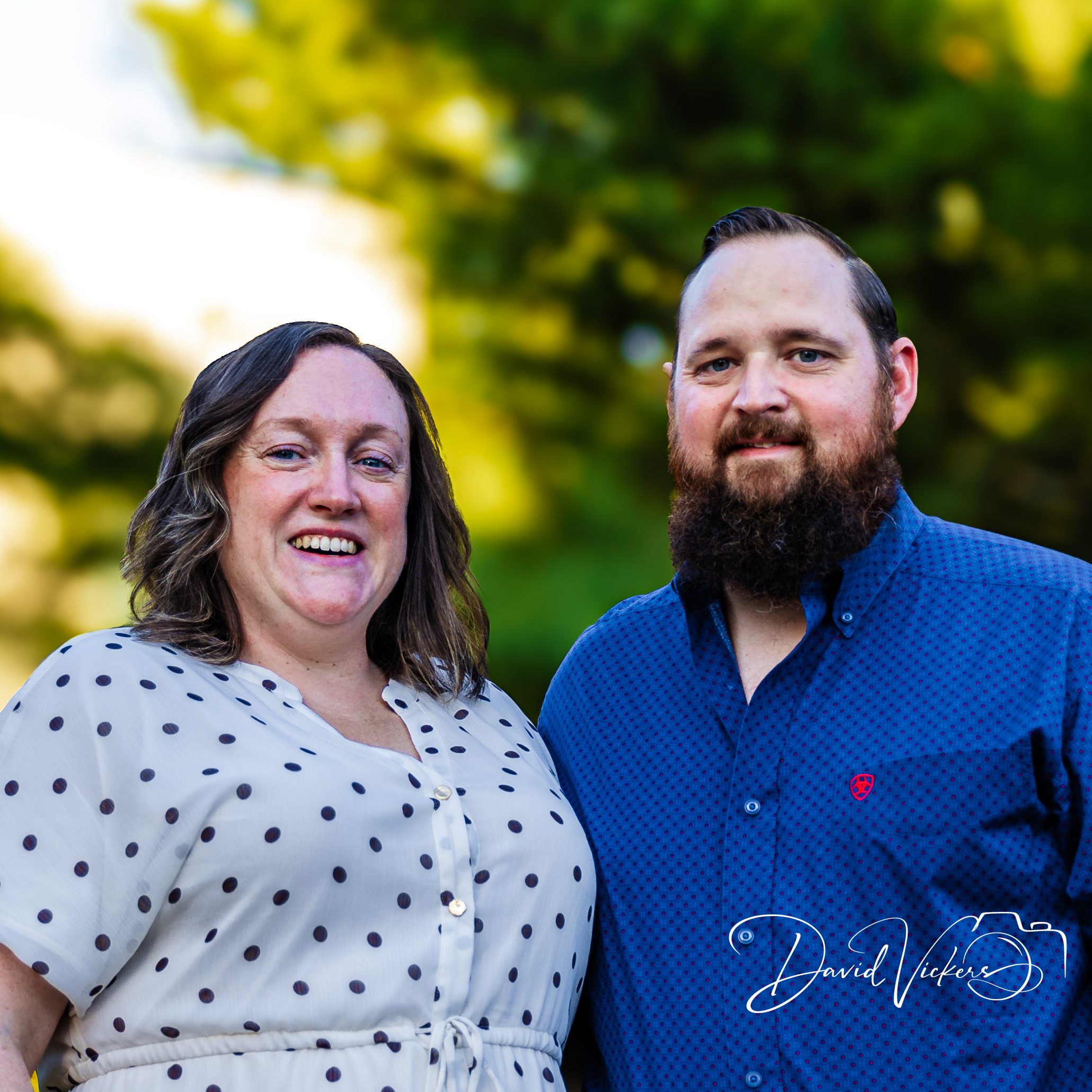 Lifestyle Family Photography in Kansas City: What to Expect Close-up of a husband and wife smiling and laughing together outdoors