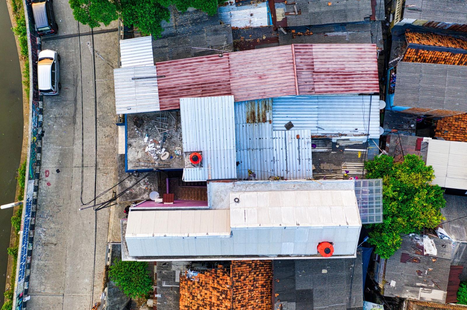 Affordable Aerial Property Photography in Kansas City vibrant aerial shot of diverse rooftops and street in bustling urban area stock 1792126686